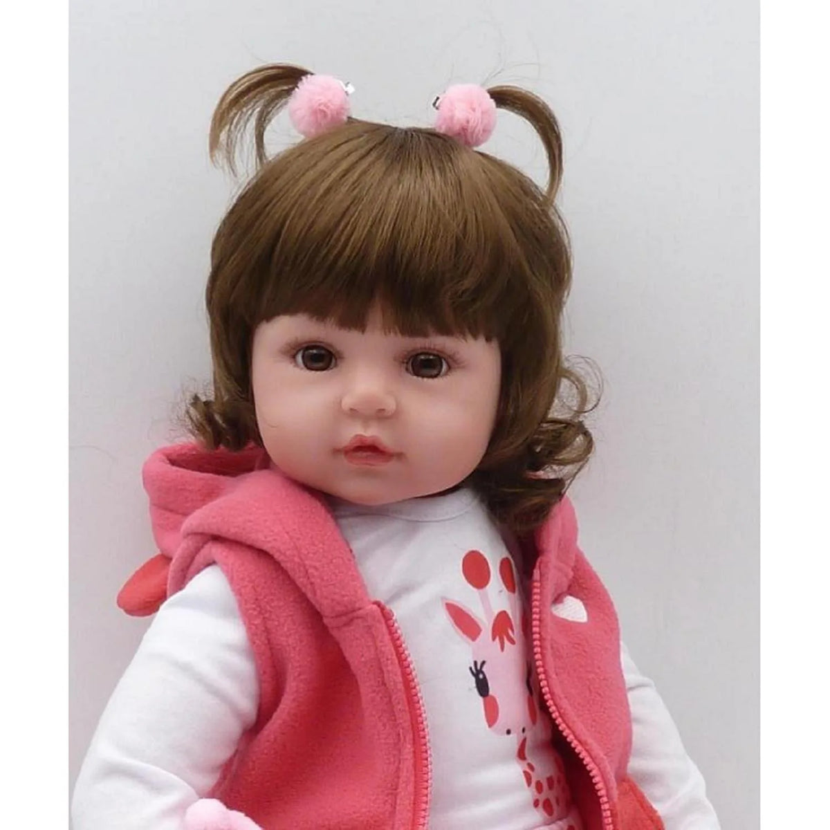 Josie 19 inch reborn baby doll with her giraffe