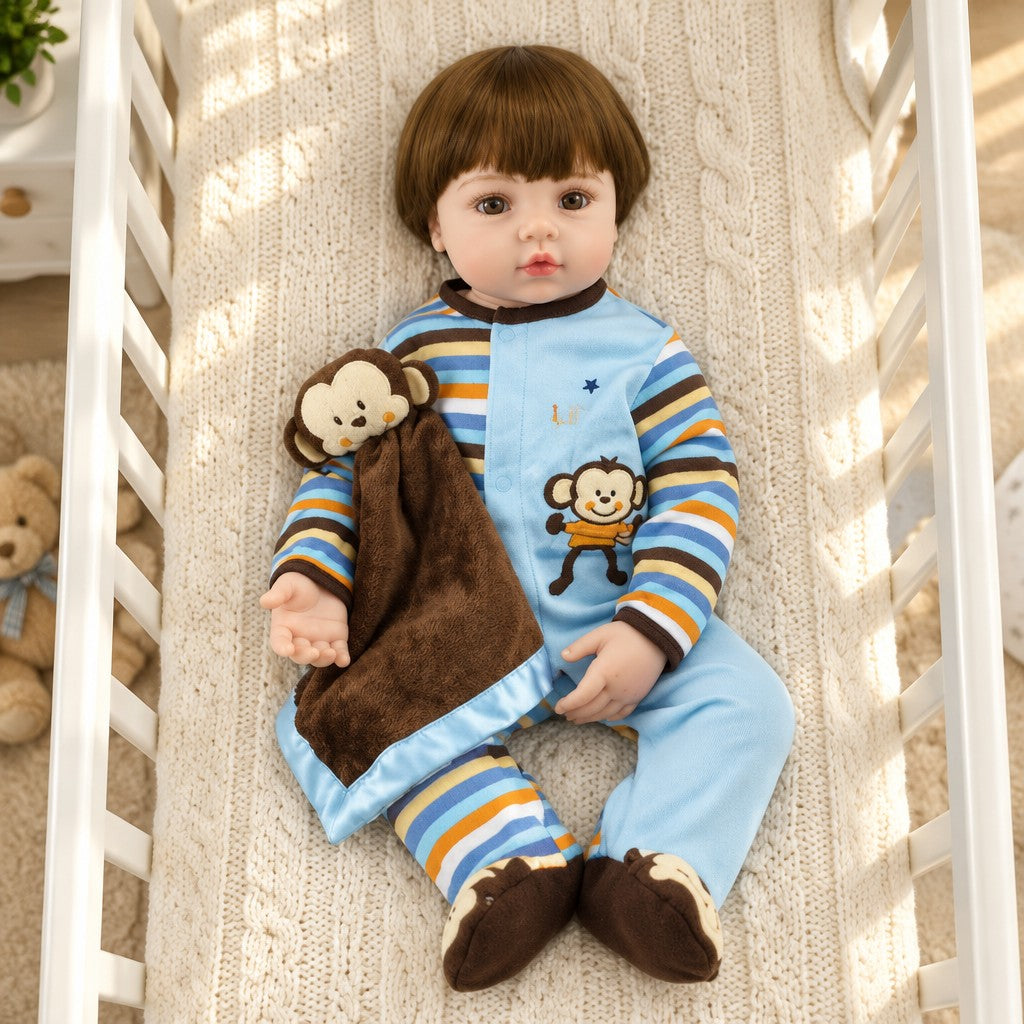 Theo 19 inch reborn baby boy doll with his monkey blanket
